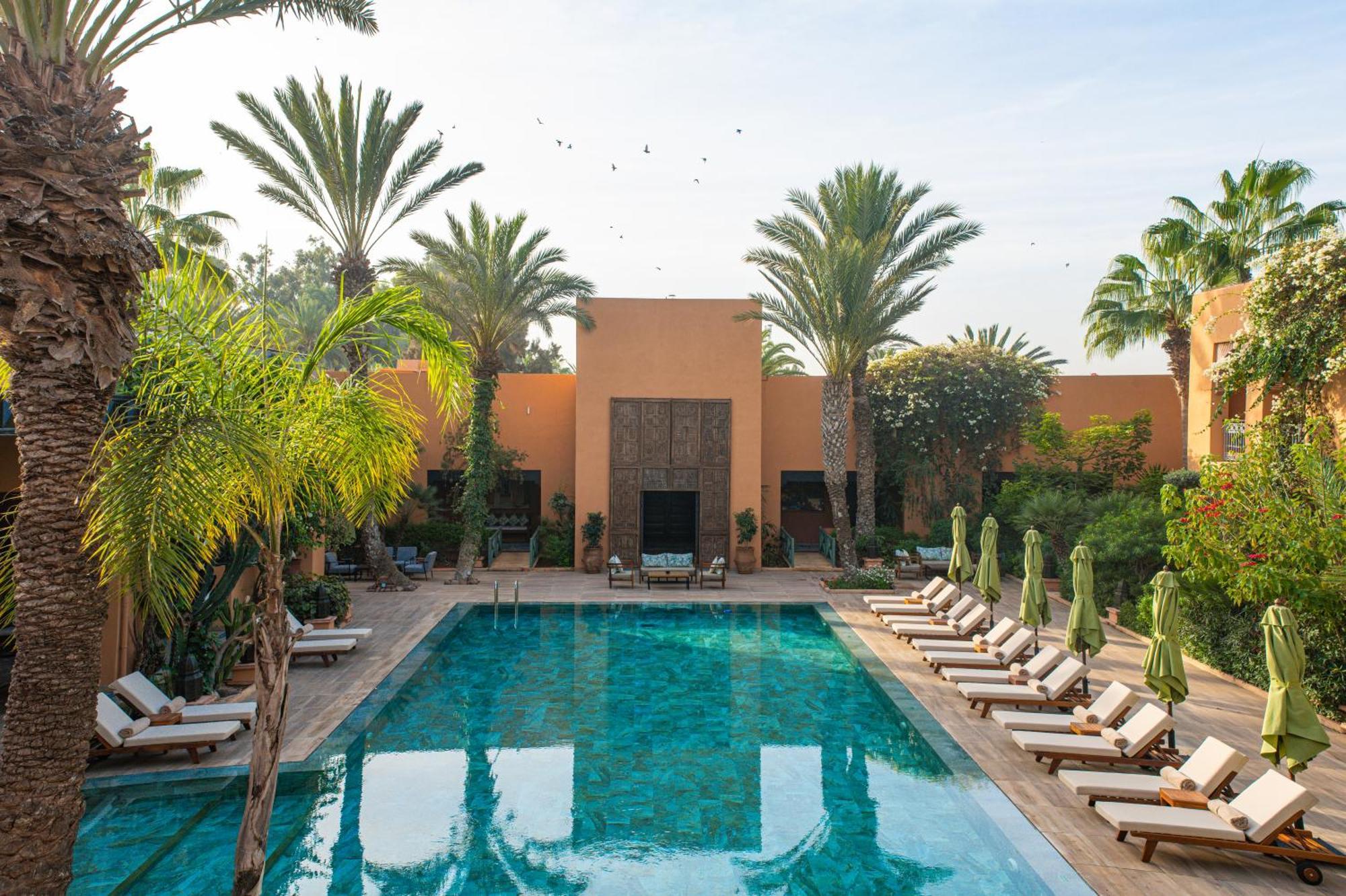 Tikida Golf Palace Agadir Zewnętrze zdjęcie The swimming pool at the Ouarzazate hotel